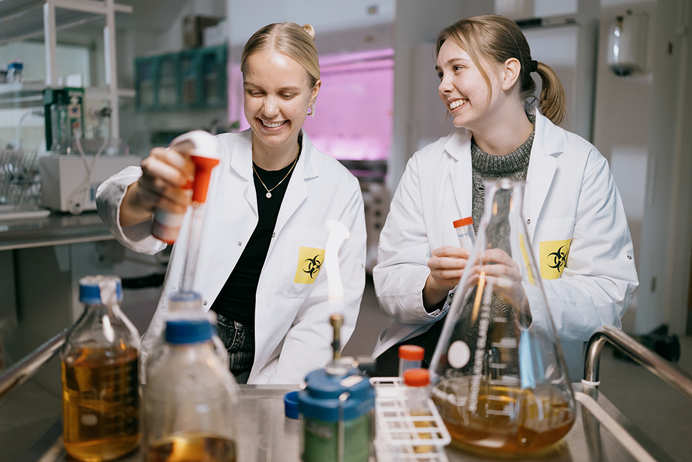 Picture of two students in a laboratory