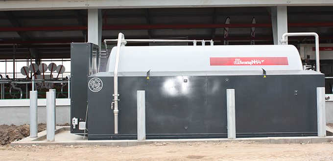 JH staldforsuring NH4+ plant installed next to dairy barn. Photo: JH Agro A/S.
